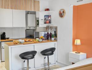 Appartements studio lumineux et moderne : photos des chambres