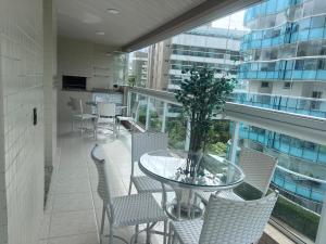 Ap Riviera pé na areia com vista