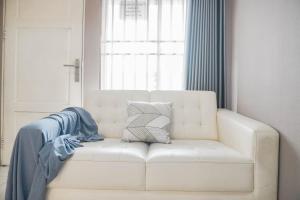 Warm and Homey 1BR at Teluk Intan Apartment By Travelio