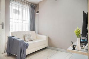 Warm and Homey 1BR at Teluk Intan Apartment By Travelio