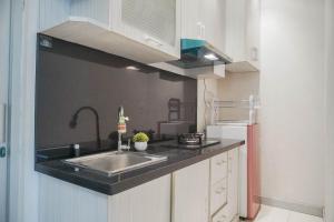 Warm and Homey 1BR at Teluk Intan Apartment By Travelio