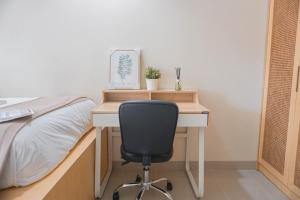 Comfy Studio at 2nd Floor Evenciio Margonda Apartment By Travelio