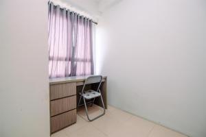 Combined 2BR with Study Room Titanium Square Apartment By Travelio