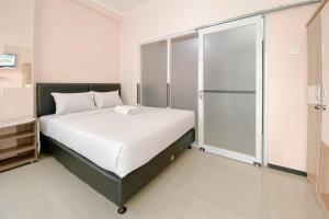 Brand New 1BR at Apartment Gateway Pasteur By Travelio