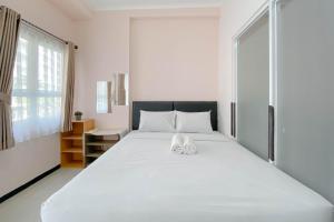 Brand New 1BR at Apartment Gateway Pasteur By Travelio