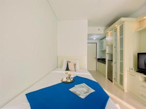 Good and Homey Studio Apartment at Transpark Cibubur By Travelio