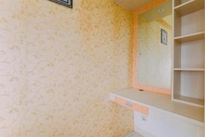Best Price and Comfortable 2BR Green Pramuka City Apartment By Travelio