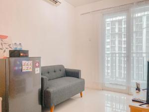 Brand New and Homey 2BR Apartment at Woodland Park Residence By Travelio