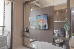 Comfort and Good Place Studio at Sky House BSD Apartment By Travelio