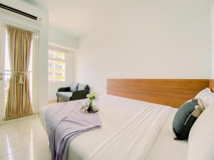 Cozy and Homey Studio at Springlake Summarecon Bekasi Apartment By Travelio