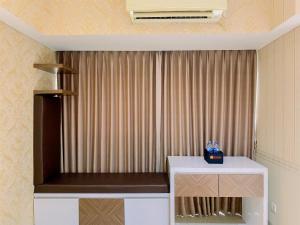 Homey and Comfy Studio H Residence Apartment By Travelio