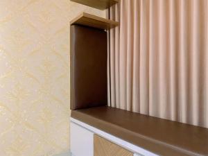 Homey and Comfy Studio H Residence Apartment By Travelio