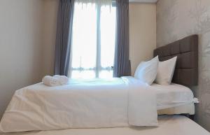 Comfy 2BR at The Mansion Kemayoran Apartment By Travelio