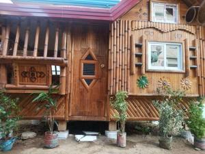 Aremen Transient, Nipa Hut with shared main houses bathroom - Ubytování bez kategorie ve městě San Juan