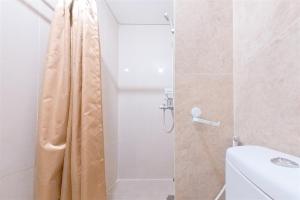 Homey Studio at Transpark Bintaro Apartment By Travelio