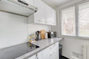 Appartements Bel appartement pour 8 personnes a 15 minutes CDG : photos des chambres