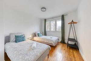 Appartements Bel appartement pour 8 personnes a 15 minutes CDG : photos des chambres