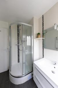 Appartements Bel appartement pour 8 personnes a 15 minutes CDG : photos des chambres