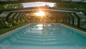 Campings Chalet 4 etoiles - Piscine - ccafdif : photos des chambres