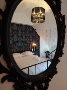 Maisons de vacances Le Triplex Romantique Balneo duo et Sauna : photos des chambres