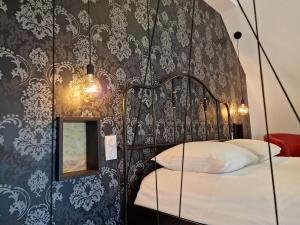 Maisons de vacances Le Triplex Romantique Balneo duo et Sauna : photos des chambres