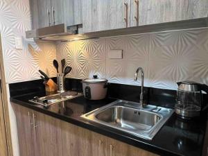 Stylist hideaway in d heart of MOA