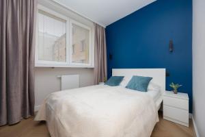 Apartament w Sercu Warszawy Biurko do Pracy Zdalnej by Noclegi Renters