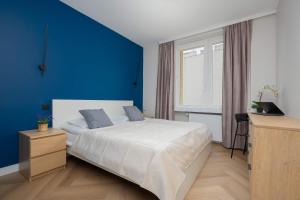 Apartament w Sercu Warszawy Biurko do Pracy Zdalnej by Noclegi Renters