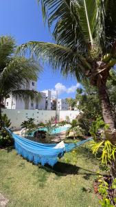 Casa na praia com jardim e piscina