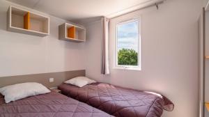 Campings L'Oasis : photos des chambres