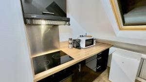 Appartements Le Chablis - Proche Centre & CHU, avec MiniBar : photos des chambres