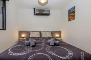 Appartements Le Refuge - Appt Neuf a 10 min de la plage : photos des chambres