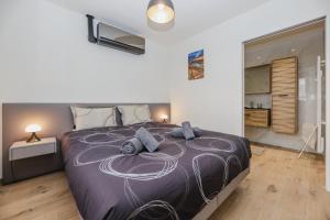 Appartements Le Refuge - Appt Neuf a 10 min de la plage : photos des chambres