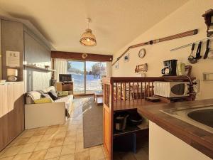 Appartements Studio ski-in/ski-out a Notre-Dame-de-Bellecombe, piscine, tennis, parking - 4 personnes - FR-1-595-3 : photos des chambres