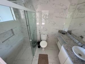 Suíte Grande com AR, TV e sacada em Florianópolis