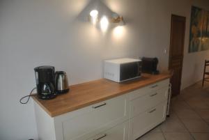 Maisons de vacances Agreable maison calme avec terrasse, jardin et vue sur verger : photos des chambres