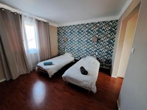 Appartements Le brin de soleil reposant : photos des chambres