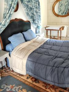 Maisons de vacances Maison charmante a Courchamps avec vue sur jardin : photos des chambres