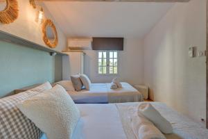 Villages vacances Les Garrigues de la Vallee des Baux : photos des chambres