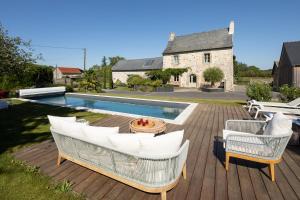 B&B / Chambres d'hotes Manoir de la Nogrie - Chambre de charme avec acces privatif - Piscine chauffee sur domaine 5 etoiles : photos des chambres