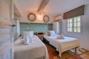 Villages vacances Les Garrigues de la Vallee des Baux : photos des chambres