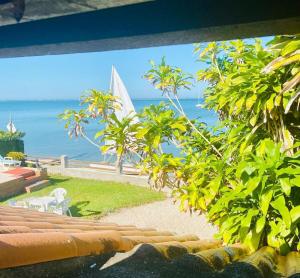 Pé na Areia Budha House