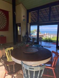 Pé na Areia Budha House