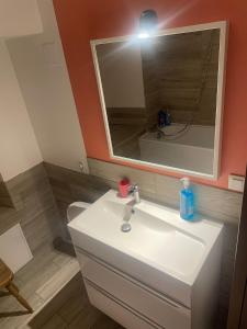 Appartements Caveau 1751 : photos des chambres