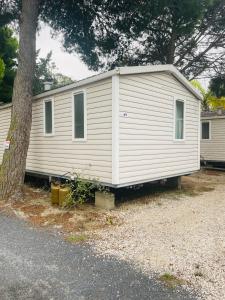 Campings Mobil-home 3 chambres, Plage & piscine, camping 4 etoiles : photos des chambres