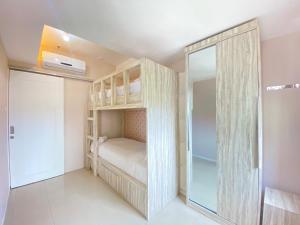 Nice and Cozy 2BR Apartment at Parahyangan Residence By Travelio