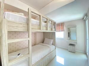 Nice and Cozy 2BR Apartment at Parahyangan Residence By Travelio