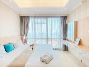 Good and Relaxing 2BR at Menteng Park Apartment By Travelio