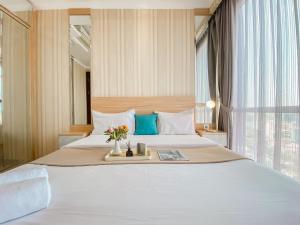 Good and Relaxing 2BR at Menteng Park Apartment By Travelio