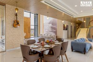 StayVista at Priana - A luxury Pool Villa with Gym